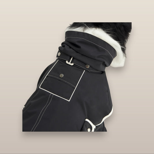 MoonRise Lulu ultra-soft dog raincoat in ink black with white trim and metallic snap button details