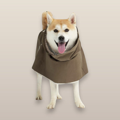 MoonRise Lulu ultra-soft raincoat in French Taupe worn by a smiling Shiba Inu dog