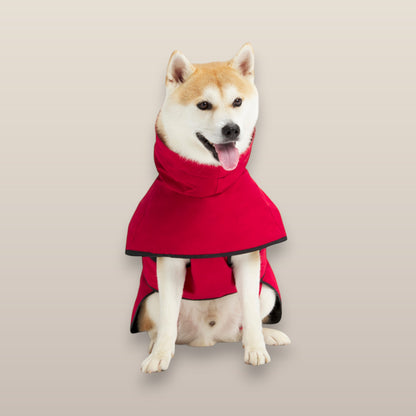 MoonRise Lulu ultra-soft red dog raincoat worn by a Shiba Inu sitting against a neutral background